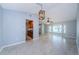 Open-concept living space showcasing the kitchen, dining and living areas, creating a cohesive and inviting atmosphere at 2609 Sunnyside Cir, Palm Harbor, FL 34684