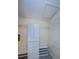 Functional walk-in closet with shelving, drawers, and a built-in shoe rack for organized storage at 2609 Sunnyside Cir, Palm Harbor, FL 34684