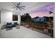 Spacious balcony with comfortable seating, offering tranquil views of the lush landscape at 2707 Ridgewood Ave, Tampa, FL 33602