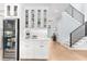 Bright, well lit butler's pantry area with custom cabinets and wine fridge at 2707 Ridgewood Ave, Tampa, FL 33602