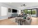 Inviting living room with sliding glass doors that lead to the backyard and pool, enhancing indoor-outdoor living at 2707 Ridgewood Ave, Tampa, FL 33602