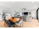 Open living area with a staircase, and a large sectional couch. Perfect for entertaining Gathering and friends at 2707 Ridgewood Ave, Tampa, FL 33602