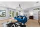 Luxurious main bedroom boasts large windows, a ceiling fan, and ample space at 2707 Ridgewood Ave, Tampa, FL 33602