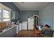 Cozy kitchen with laminate floors, stainless steel sink, and appliances at 3009 N 13Th St, Tampa, FL 33605