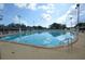 An outdoor pool with clear water and a brick surround, perfect for a refreshing swim at 3009 N 13Th St, Tampa, FL 33605