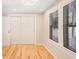 Bright bedroom with hardwood floors, closet, and plenty of natural light at 4106 N Central Ave, Tampa, FL 33603