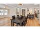 Bright dining room features hardwood floors, and an open layout with seamless access to the adjacent kitchen at 4106 N Central Ave, Tampa, FL 33603