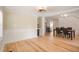 Bright dining room features hardwood floors and an open layout with seamless access to other rooms at 4106 N Central Ave, Tampa, FL 33603