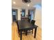 Bright dining room with hardwood floors, seamlessly connected to the open-concept kitchen at 4106 N Central Ave, Tampa, FL 33603