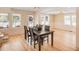 Bright dining room features hardwood floors and ample natural light through multiple windows at 4106 N Central Ave, Tampa, FL 33603