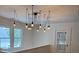 Foyer featuring a unique hanging light fixture and staircase at 4106 N Central Ave, Tampa, FL 33603