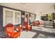 Inviting front porch with comfortable seating, perfect for enjoying the outdoors at 4106 N Central Ave, Tampa, FL 33603