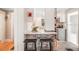 Modern kitchen features a breakfast bar with stylish seating and an efficient layout at 4106 N Central Ave, Tampa, FL 33603
