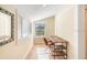 Office space features hardwood floors, bright windows, and an office table and chair at 4106 N Central Ave, Tampa, FL 33603