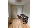 Cozy office space with hardwood floors, a desk, and natural light, perfect for remote work at 4106 N Central Ave, Tampa, FL 33603