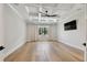 Spacious, bright bedroom with hardwood floors, coffered ceiling, and large windows at 4109 W Inman Ave, Tampa, FL 33609