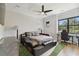 This bedroom features unique decor, a ceiling fan, and a work space at 4109 W Inman Ave, Tampa, FL 33609