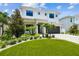 Beautiful two-story home with landscaped front yard and modern architectural details at 4109 W Inman Ave, Tampa, FL 33609