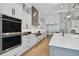 Gourmet kitchen features professional-grade stainless appliances, custom cabinets, and a stylish backsplash at 4109 W Inman Ave, Tampa, FL 33609