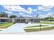 Charming single-story home boasting stone accents, a spacious driveway, and well-maintained landscaping at 4652 Swallowtail Dr, New Port Richey, FL 34653