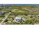 Aerial view of estate showing a backyard oasis, including a pool, guesthouse and large tract at 4710 Troydale Rd, Tampa, FL 33615