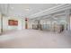 Expansive loft area with abundant natural light and architectural details, perfect for versatile living space at 4710 Troydale Rd, Tampa, FL 33615