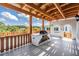 Outdoor kitchen area with a built-in grill, perfect for entertaining with scenic views at 4710 Troydale Rd, Tampa, FL 33615