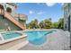 Relaxing pool and spa, perfect for entertaining, with lush tropical landscaping and serene outdoor living space at 4710 Troydale Rd, Tampa, FL 33615