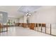 Bright living room with decorative ceiling, tile flooring, and natural light at 4739 114Th N St, St Petersburg, FL 33708