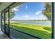Enjoy the beautiful lake view from this screened-in patio, perfect for outdoor living at 4743 Somerset Hill Ln, Riverview, FL 33578