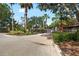 Community entrance with mature trees and brick signage that reads 'Palma Vista' at 4920 Anniston Cir, Tampa, FL 33647