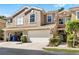 Charming two-story townhome with a two-car garage and well-maintained landscaping at 4920 Anniston Cir, Tampa, FL 33647