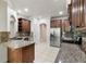 Well-designed kitchen with granite countertops, stainless steel appliances, and ample cabinet space at 4920 Anniston Cir, Tampa, FL 33647