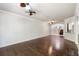 Spacious living room with hardwood floors and ceiling fans at 4920 Anniston Cir, Tampa, FL 33647