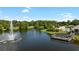 Aerial view of the community pond and surrounding amenities at 4920 Anniston Cir, Tampa, FL 33647