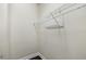 Empty walk-in closet with wire shelves, ready to be organized at 4920 Anniston Cir, Tampa, FL 33647