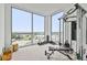 Home gym featuring weight training equipment and floor to ceiling windows for beautiful views during your workout at 5120 Marina Way # 15005, Tampa, FL 33611