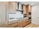 Modern kitchen with wood cabinets, sleek countertops, stainless steel appliances, and an efficient layout at 5120 Marina Way # 15005, Tampa, FL 33611