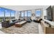 Contemporary living room featuring expansive windows and city views at 5120 Marina Way # 15005, Tampa, FL 33611