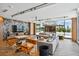 Modern living room with stylish furnishings, large windows, and access to outdoor amenities, creating a comfortable space at 5120 Marina Way # 15005, Tampa, FL 33611