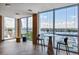 Cozy lounge area with waterfront views, a marble table, and comfortable seating overlooking the marina at 5120 Marina Way # 15005, Tampa, FL 33611
