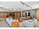 Comfortable lounge with modern furniture, a large television, and access to bar and entertaining area at 5120 Marina Way # 15005, Tampa, FL 33611