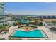 Luxury waterfront living featuring an amazing pool, cabana lounges, and breathtaking city views from a modern high-rise condo at 5120 Marina Way # 15005, Tampa, FL 33611