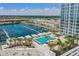 High-rise condo featuring an amazing pool with marina views, cabana lounges, and beautifully landscaped common areas at 5120 Marina Way # 15005, Tampa, FL 33611