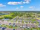 Expansive aerial view of a residential community with beautiful homes, lush landscaping and serene lake views at 537 Ocean Spray Dr, Ruskin, FL 33570