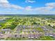 Expansive aerial view of a residential community with beautiful homes, lush landscaping and serene lake views at 537 Ocean Spray Dr, Ruskin, FL 33570