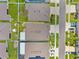 Aerial view showcasing well-maintained roofs, manicured lawns, driveways, and landscaping of homes in a neighborhood at 537 Ocean Spray Dr, Ruskin, FL 33570