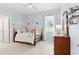 Bright bedroom featuring a twin bed, window, and a ceiling fan, perfect for a room at 537 Ocean Spray Dr, Ruskin, FL 33570
