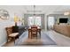 Elegant dining room with natural light, stylish furniture and neutral wall colors at 537 Ocean Spray Dr, Ruskin, FL 33570