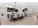 Bright kitchen featuring a large island with bar seating and stainless steel appliances at 537 Ocean Spray Dr, Ruskin, FL 33570